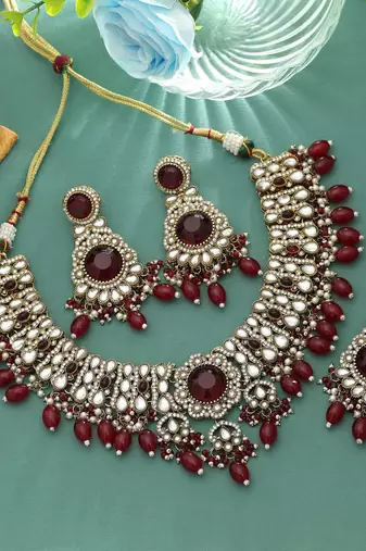 Maroon color kundan necklace set