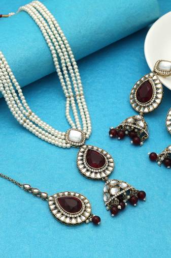 Maroon color kundan necklace set