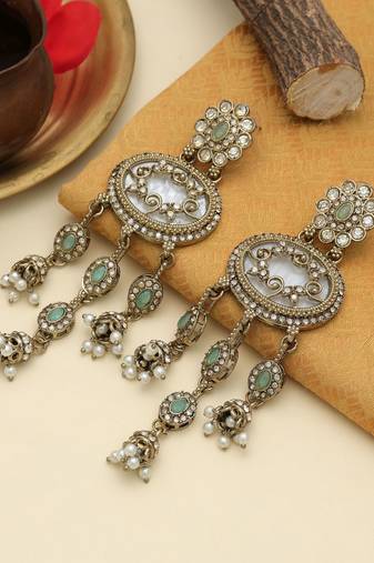 Pista green color kundan earrings