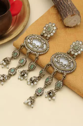Pista green color kundan earrings