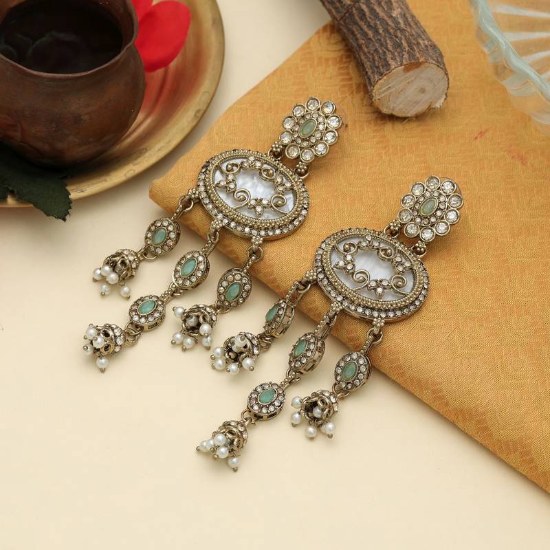 Pista green color kundan earrings