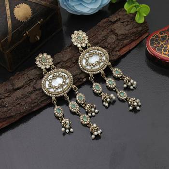 Pista green color kundan earrings 2