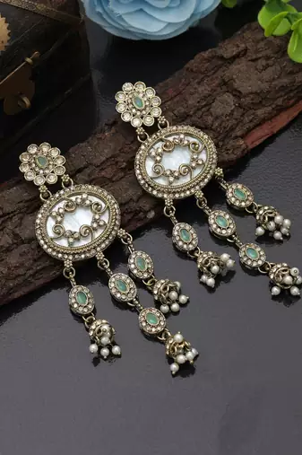 Pista green color kundan earrings