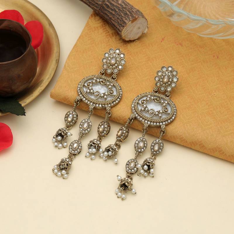 Gold color kundan earrings