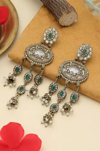 Green color kundan earrings