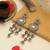 Rani color kundan earrings
