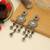Black color kundan earrings