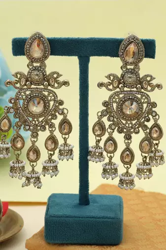 Gold color kundan earrings