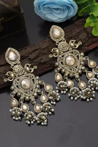 Gold color kundan earrings