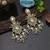 Gold color kundan earrings