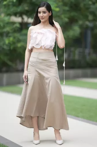 Soft pink ruffled top with pleated linen long skirt