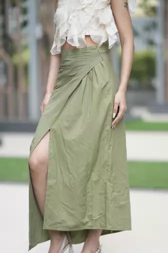 Yellow ruffled one shoulder top with bottole green cotton long skirt