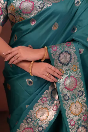 teal green floral, zari work slik blend saree with blouse