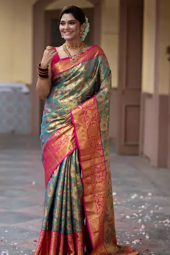 teal green floral, zari work faux kanjivaram semi silk saree with blouse