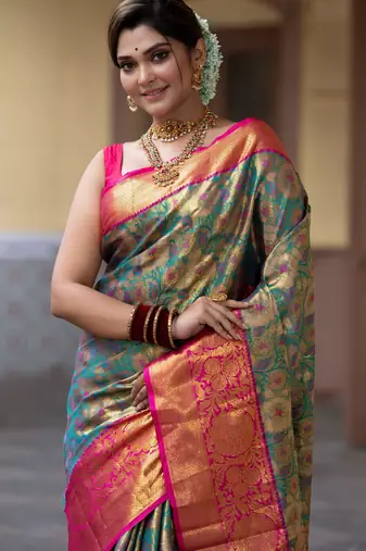 teal green floral, zari work faux kanjivaram semi silk saree with blouse