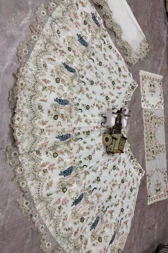 WHITE GEORGETTE  EMBROIDERY SEMI STICHED  LEHENGA WHIT BLOUSE