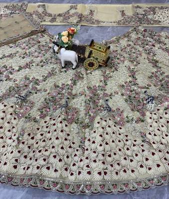 CREAM SOFT NET  EMBROIDERY SEMI STICHED  LEHENGA WHIT BLOUSE 4