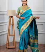turquoise blue floral, zari woven slik blend saree with blouse