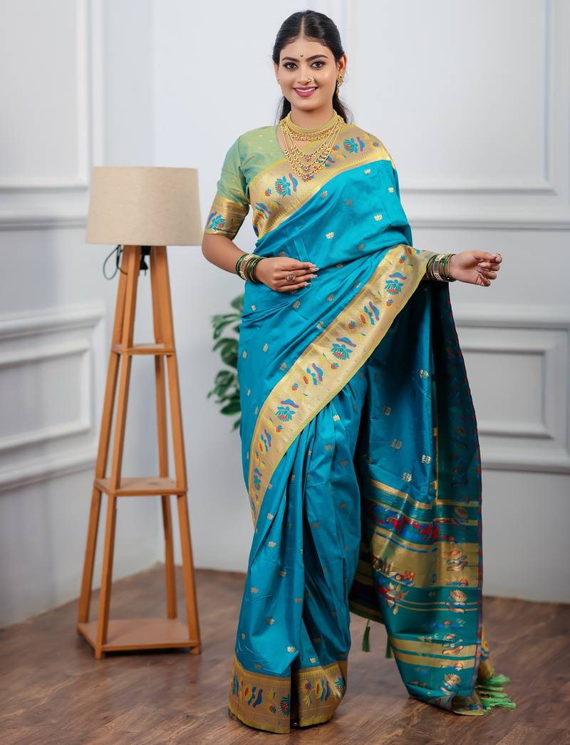 turquoise blue floral, zari woven slik blend saree with blouse