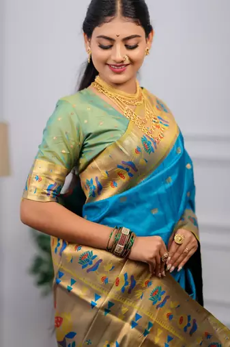 turquoise blue floral, zari woven slik blend saree with blouse