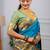 turquoise blue floral, zari woven slik blend saree with blouse