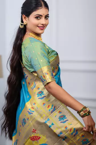 turquoise blue floral, zari woven slik blend saree with blouse