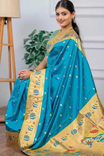 turquoise blue floral, zari woven slik blend saree with blouse