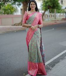 mint green floral, zari woven faux kanjivaram  semi silk saree with blouse