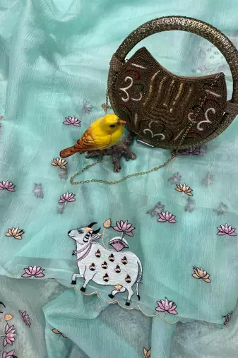 sky blue silk saree with thread floral cutwork border