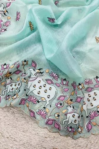 sky blue silk saree with thread floral cutwork border