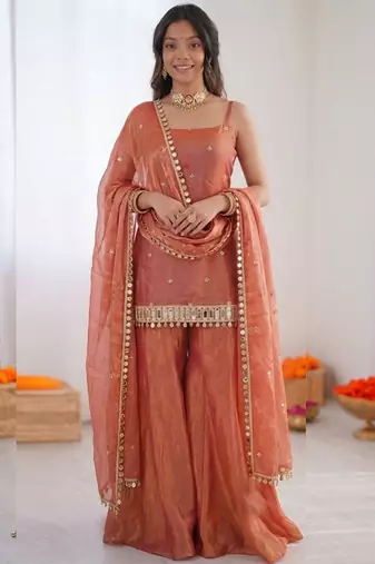 Rust orange fendy silk thread with mirror work plazzo suit