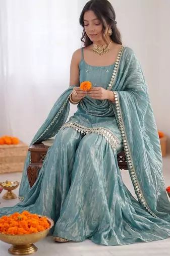 Turquoise fendy silk thread with mirror work plazzo suit