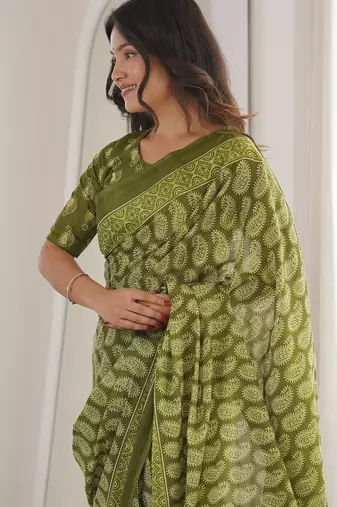 Green blocked printed, paisley soft pure cotton saree with blouse.