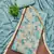 Turquoise modal printed unstitched dress material