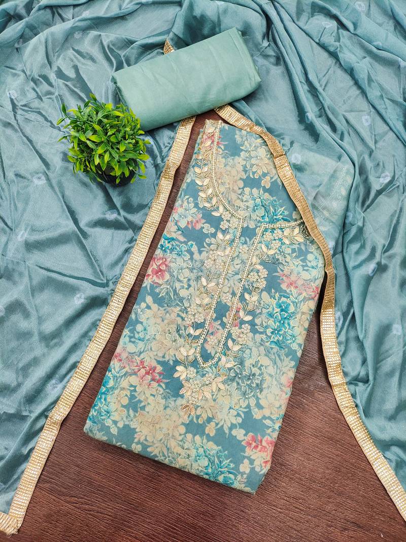 Turquoise modal printed unstitched dress material