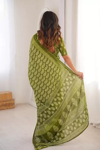 Green blocked printed, paisley soft pure cotton saree with blouse.