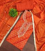 Orange cotton bandhni unstitched dress material