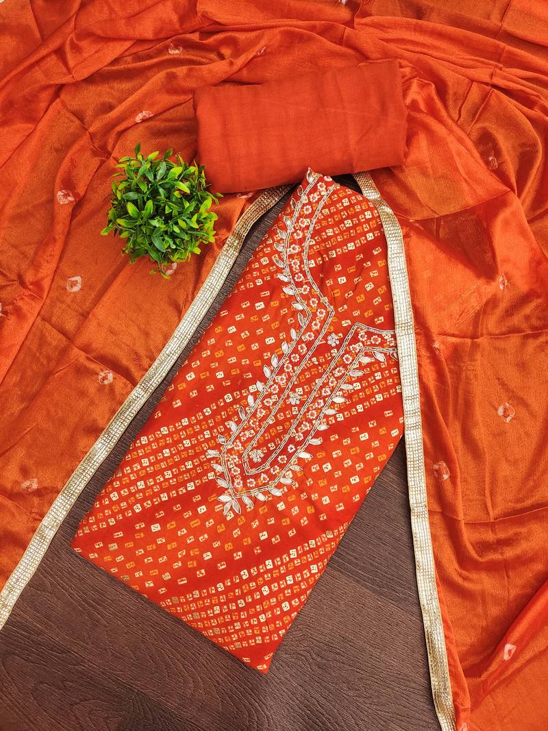 Orange cotton bandhni unstitched dress material