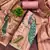 Onion cotton silk embellished unstitched dress material