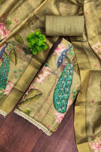 Green cotton silk embellished unstitched dress material