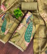 Green cotton silk embellished unstitched dress material