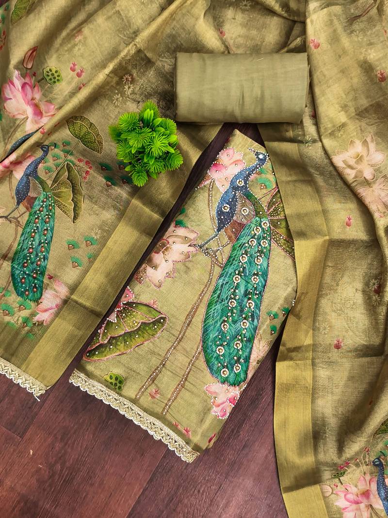 Green cotton silk embellished unstitched dress material