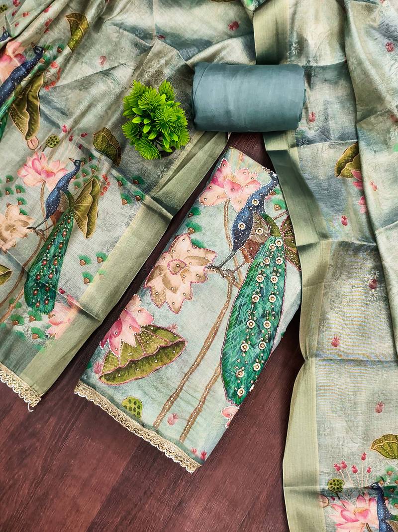 Teal cotton silk embellished unstitched dress material