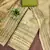 Green viscose embellished unstitched dress material