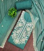 Turquoise cotton silk embroidered unstitched dress material