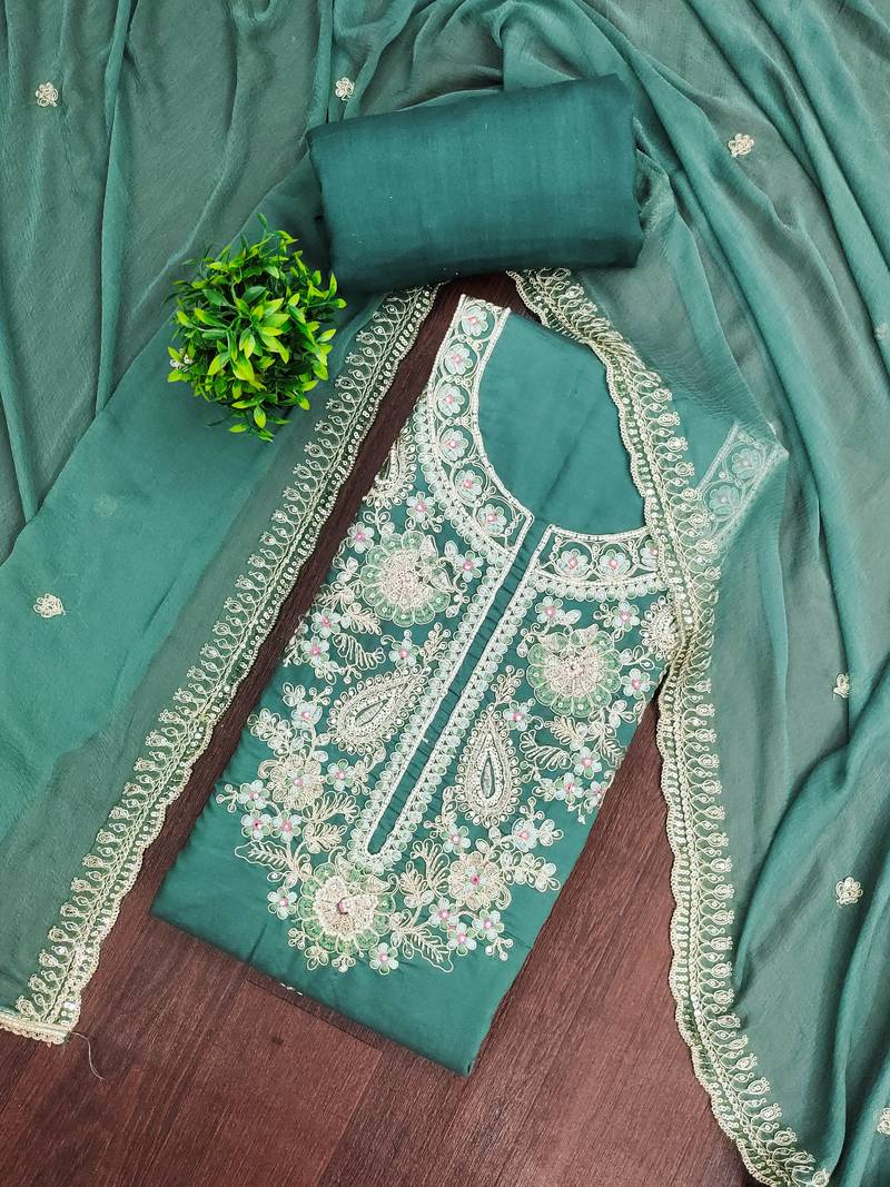 Turquoise cotton silk embroidered unstitched dress material