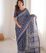 Navy blue blocked printed soft pure cotton saree with blouse.
