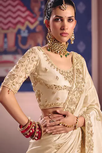 Cream viscose zari tissue silk heavy embroidery, beads with sequince work saree with blouse