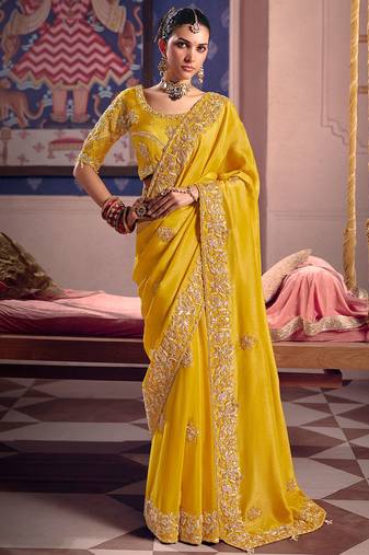 Yellow viscose zari tissue silk heavy embroidery, beads with sequince work saree with blouse
