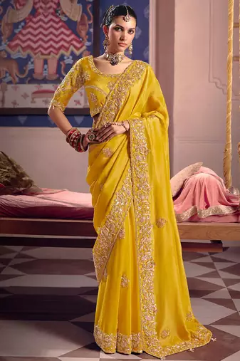 Yellow viscose zari tissue silk heavy embroidery, beads with sequince work saree with blouse